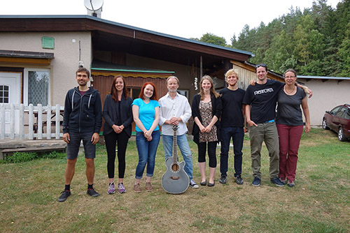 mass photo of summer camp with guitar leadership from 2018