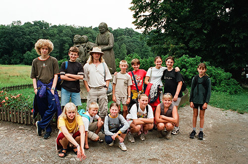 mass photo of summer camp with guitar from 2002