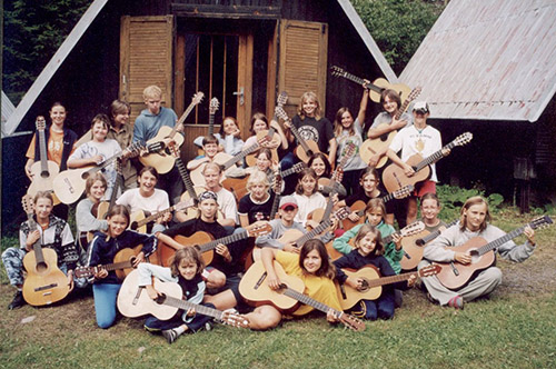 mass photo of summer camp with guitar from 2004