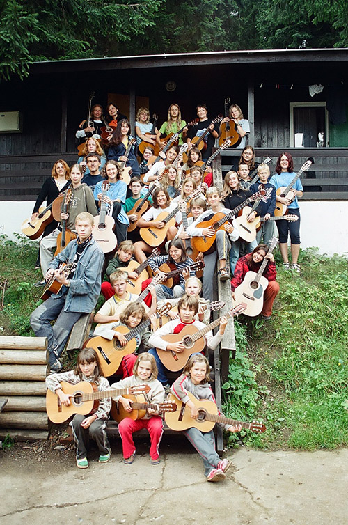 mass photo of summer camp with guitar from 2005