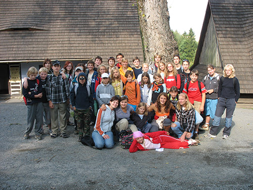 mass photo of summer camp with guitar from 2006