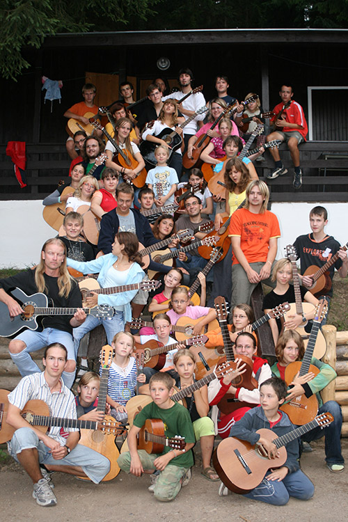 mass photo of summer camp with guitar from 2008