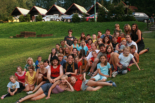 mass photo of summer camp with guitar from 2009